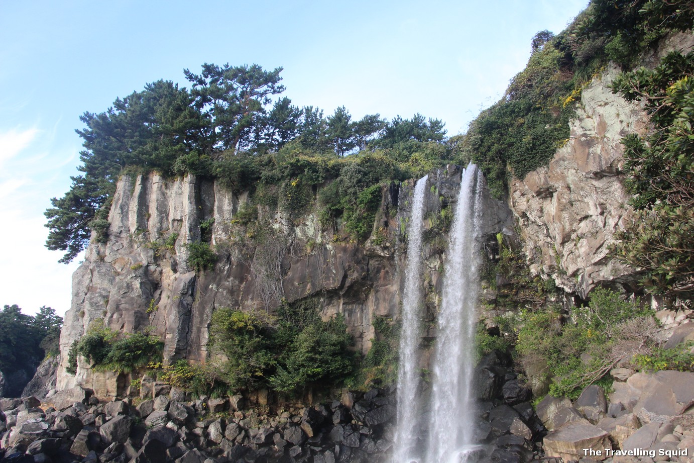 Photo Story Visiting The Jeongbang Waterfall In Jeju The Travelling Squid