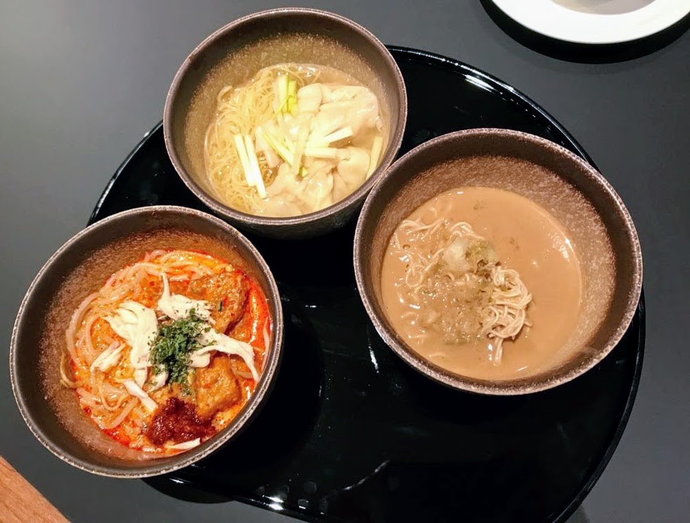 Clockwise from top: Wanton noodles, dan-dan noodles, laksa
