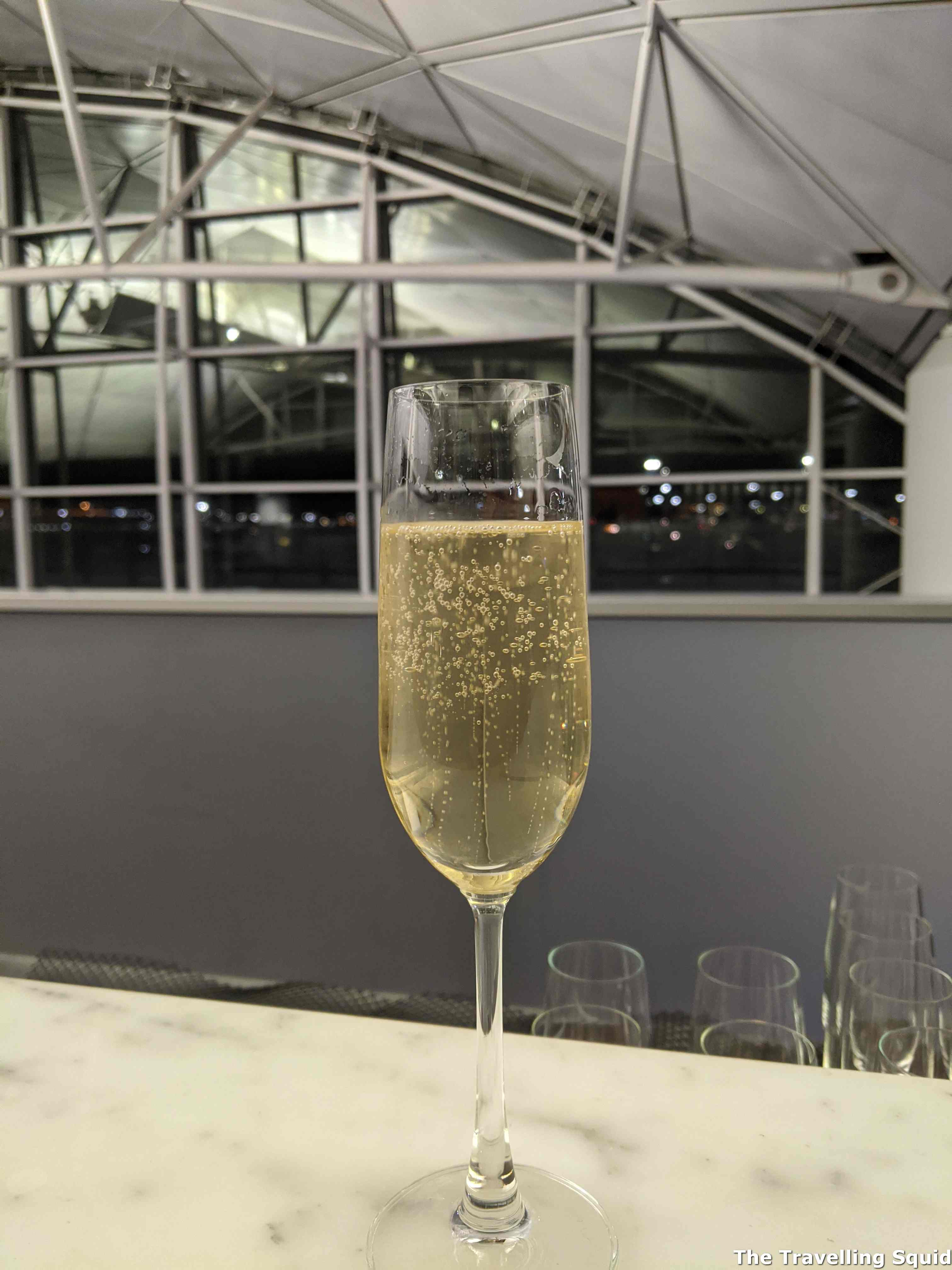 champagne the wing hk airport