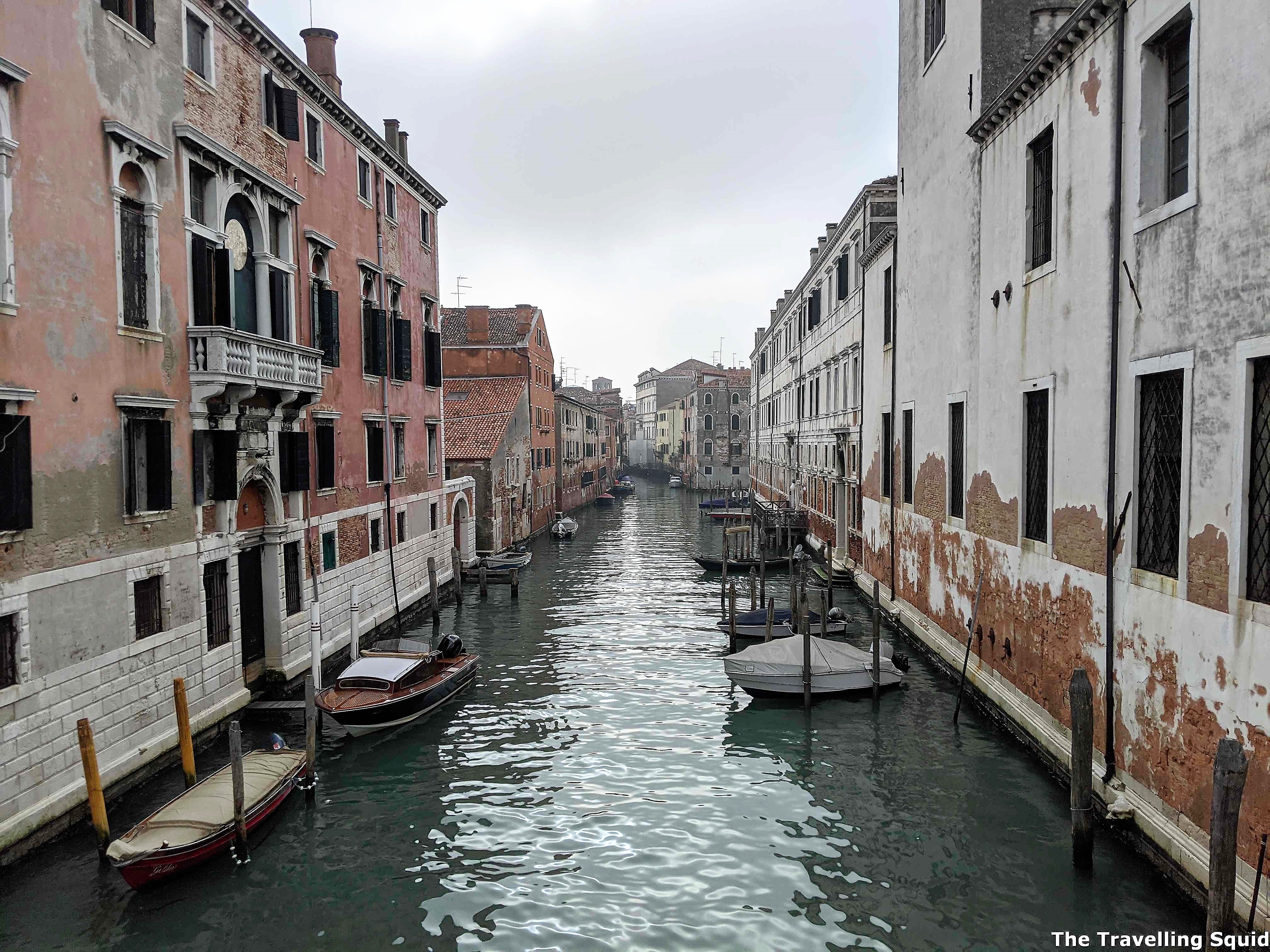 venice crumbling walls canal