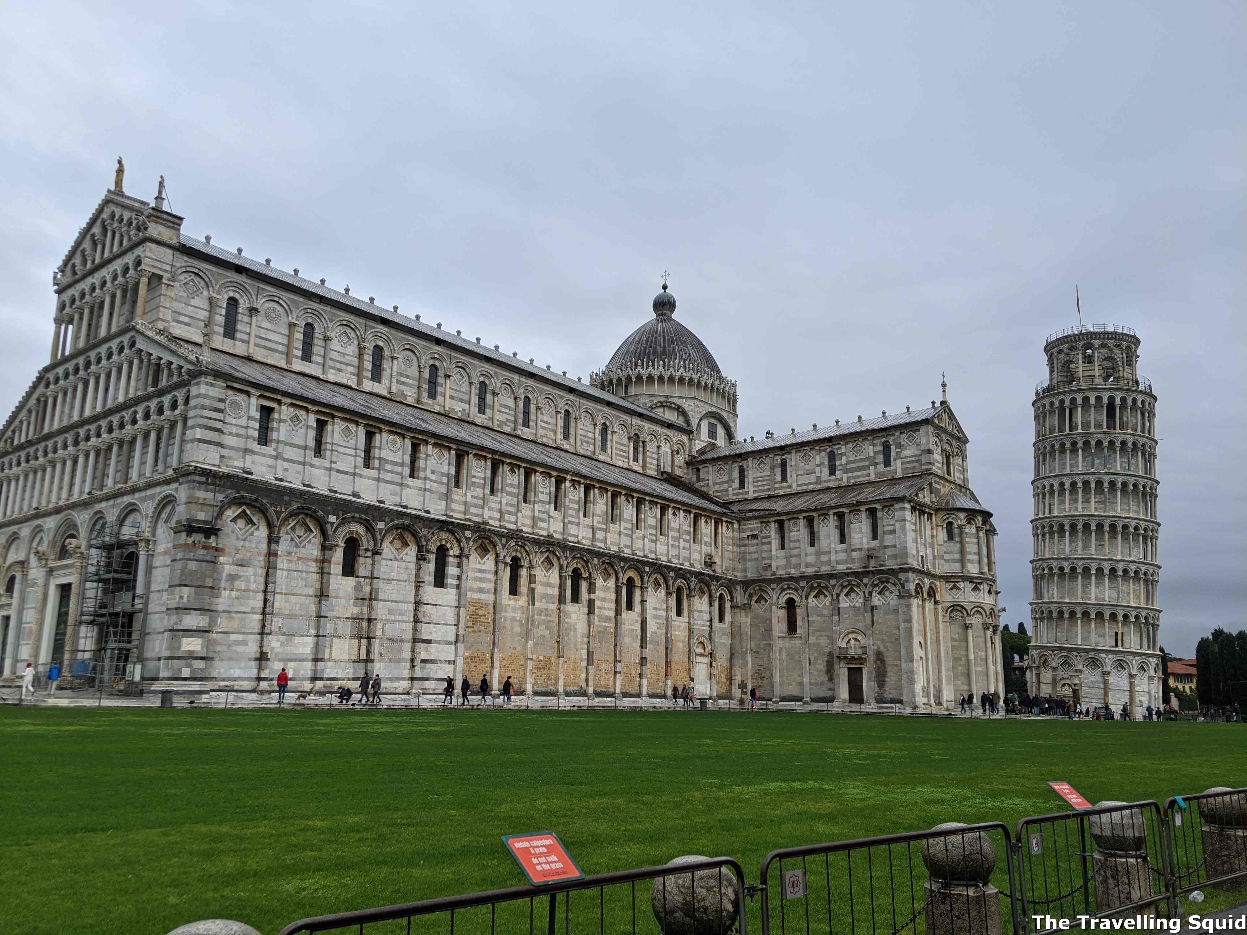 paying to climb up the Leaning Tower of Pisa